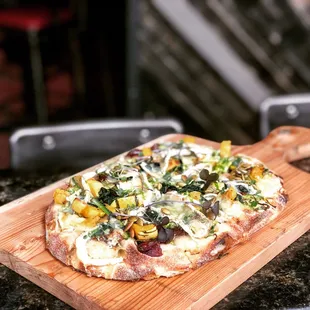 Special pinsa with delicata squash, Brussels, and Brie