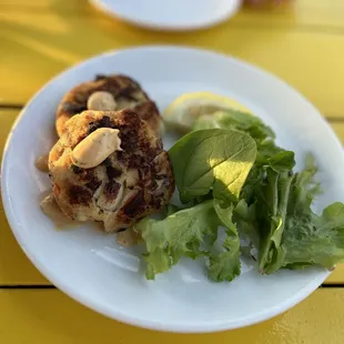 a plate of food on a yellow table