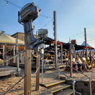 a fishing pole on the beach