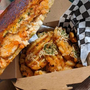 Buffalo chicken sandwich and parmesan fries