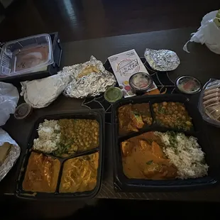 Ordered the Thali- on the left butter chicken &amp; shahi paneer, on the right chicken tikka masala &amp; chicken curry