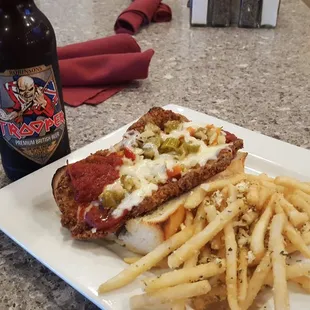 Breaded Ribeye Steak Sandwich Paired With an Iron Maiden Trooper Ale