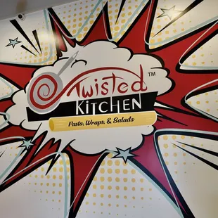 the logo for twisted kitchen
