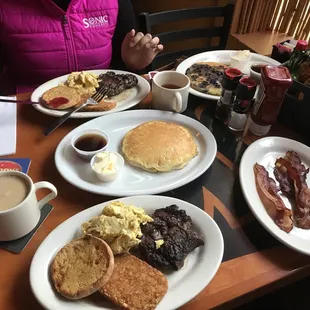 Delicious steak and eggs breakfast. With side of bacon and 2 pancakes. Not bad for $30