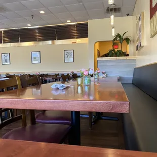 a table and chairs in a restaurant