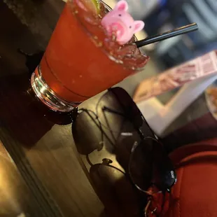 a drink with a pink pig on it