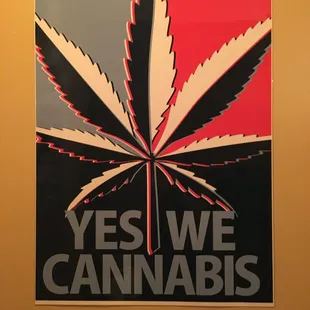 a marijuana leaf with the words yes we cannabiss