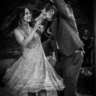 Newlyweds spinning on our 360 video booth