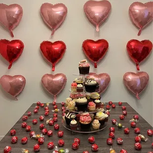 a tower of heart shaped balloons