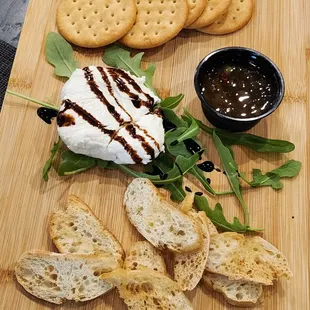 cheese, crackers, crackers, and sauce