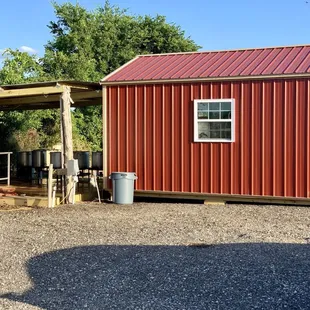 The food stand.  When it's hot outside he'll bring your order to your car!!