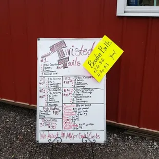 a sign in front of a building