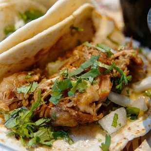 a plate of tacos and rice