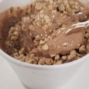 Peanut butter cup and chocolate yogurt plus crushed Heath bar topping.