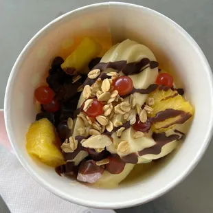 Pineapple sherbet with fruity toppings.