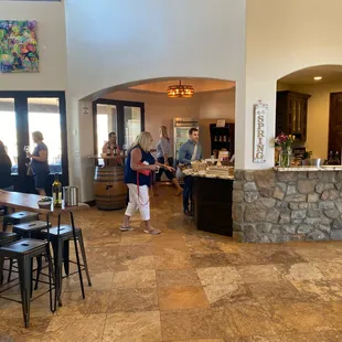 a group of people in a tasting room