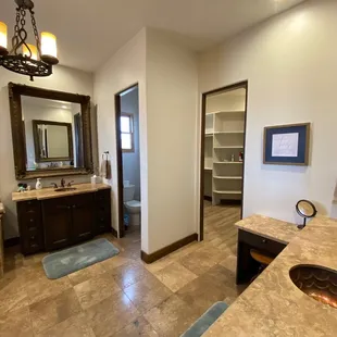 a bathroom with a sink and tub