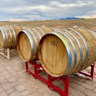 a row of wine barrels