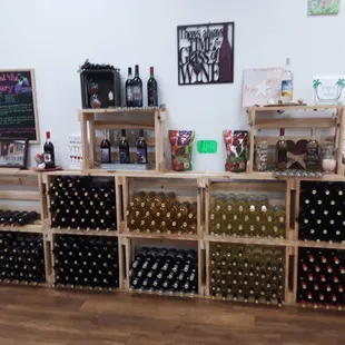 a wine rack with bottles of wine