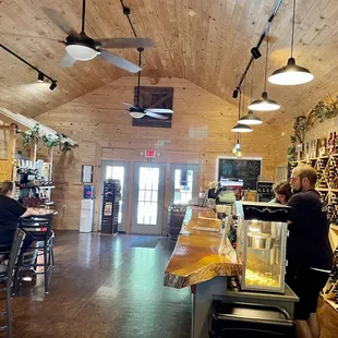 A working barn transformed into such a lovely relaxing wine sipping place.