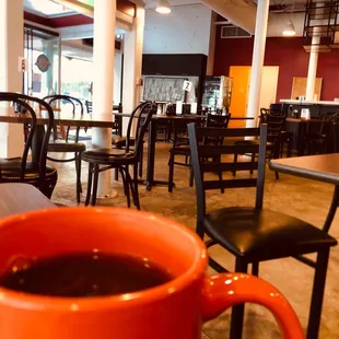 a cup of coffee on a table