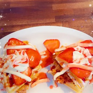 The chicken and waffles with strawberries.
