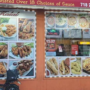 a bicycle parked in front of a restaurant