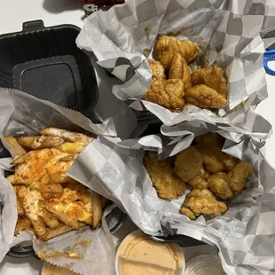 Stinging honey garlic and pineapple jalapeño boneless wings with a regular loaded fries!