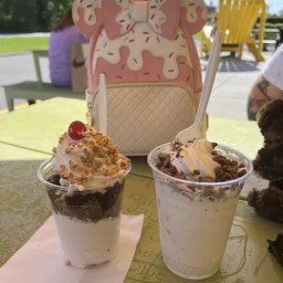 Hot fudge sundae (left) &amp; Twistee with peanut butter cups (right)