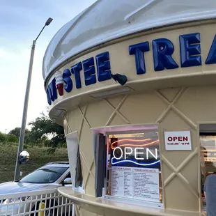 an ice cream cone with a sign on it
