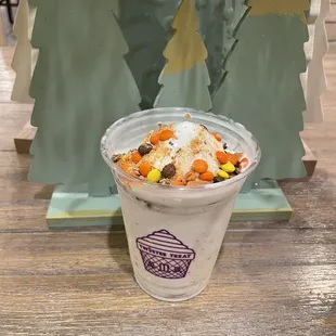 Reece&apos;s pieces + butterfinger w/ vanilla soft serve twistee.