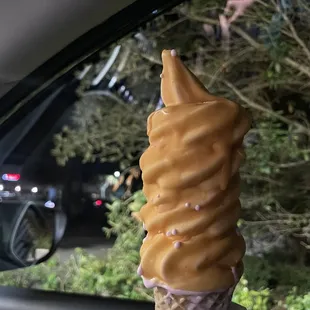Strawberry soft serve w/ butterscotch dipping.