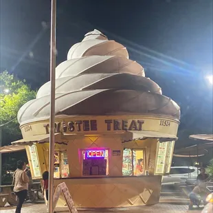 a giant ice cream cone on display