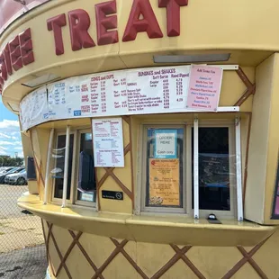 an ice cream shop on a sunny day