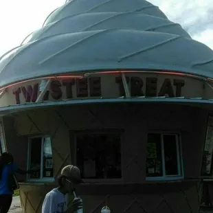 a man sitting at a picnic table