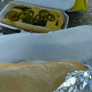 a hot dog with jalapeno peppers