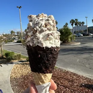 Fancy waffle cone (choco-Oreo top), with s&apos;mores crunch pieces!