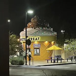 an ice cream shop at night