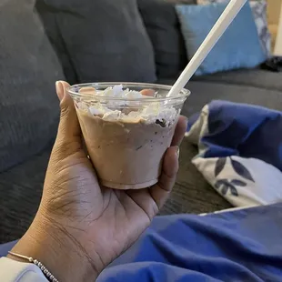 Small chocolate cup with sprinkles,whipped cream, and next to no Reese&apos;s cups.