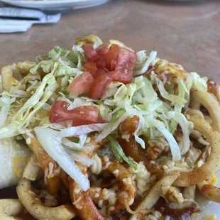 Twister Ground Beef burrito with "Christmas style " chili.