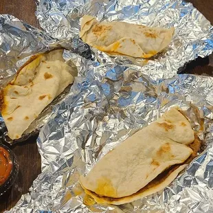 Two bean and chorizo tacos and one potato and chorizo breakfast tacos   delicious!!