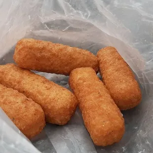 a basket of fried tater tots