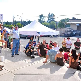 Joel addresses the crowd at the opening party