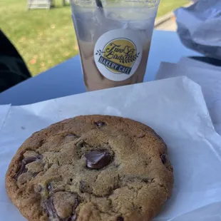 a chocolate chip cookie and iced coffee
