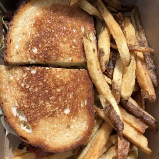 Pastrami sandwich with fries