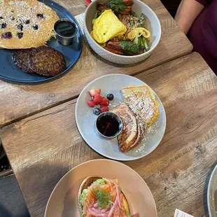 Blueberry pancakes with sausage, Farro grain bowl, French toast, salmon avocado toast