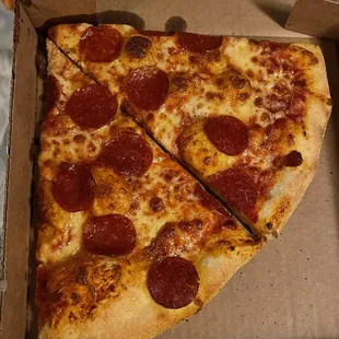 two slices of pepperoni pizza