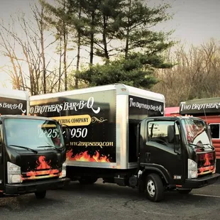 two trucks parked in a parking lot