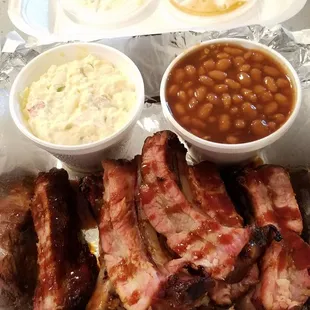 Rib platter with potato salad and beans. RIBS were the BOMB!