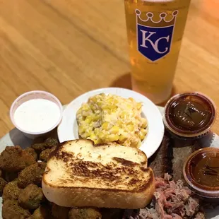 Fried okra, garlic toast, creamed corn, brisket and pulled pork!  Delicious!